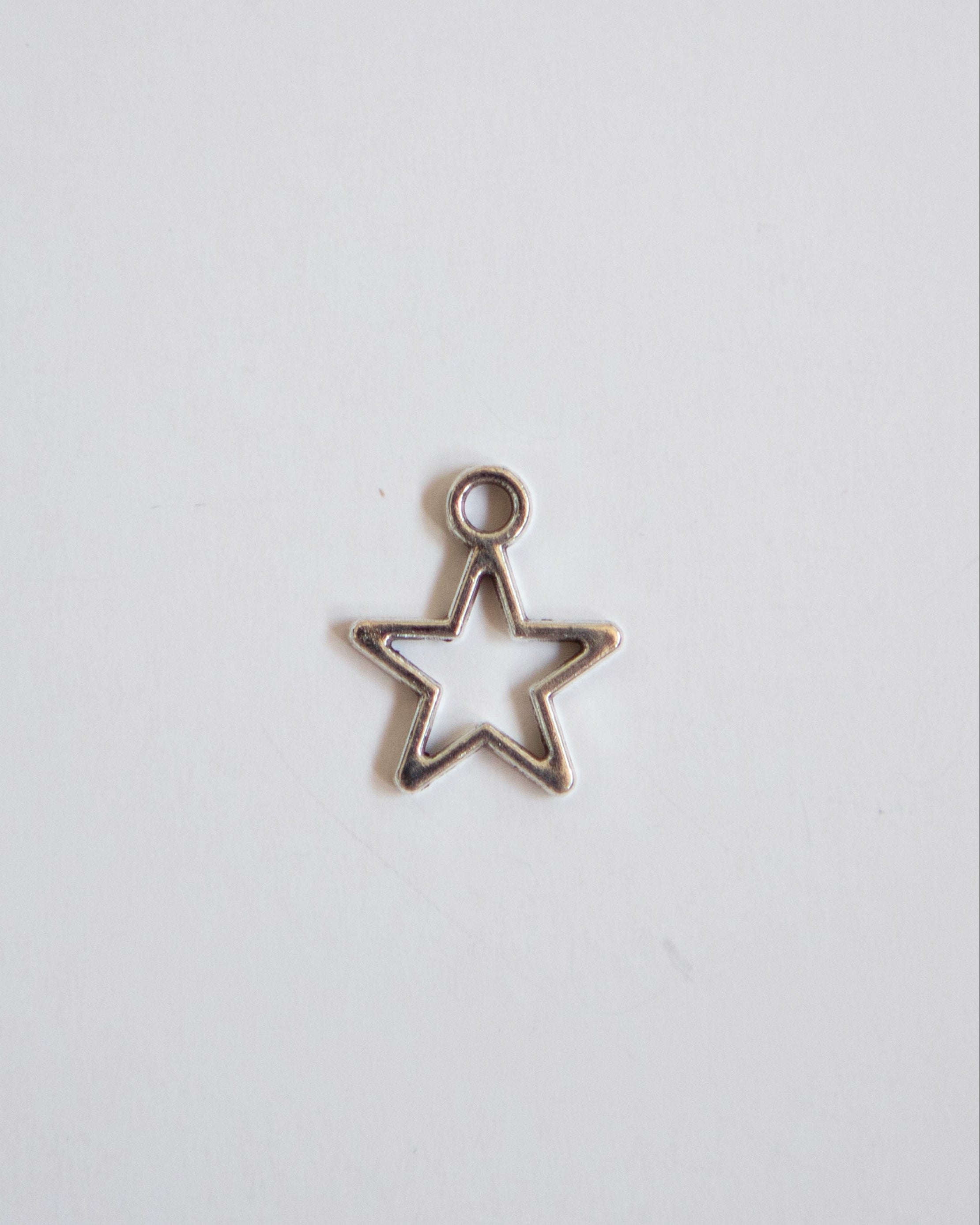 Silver Star Charm
